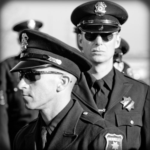Police Response Time - Two policemen in black and white photo