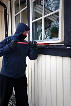 Home invasions - Burglar breaking into a home