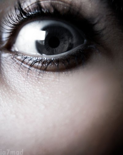 Your crime stories - close up of woman's eye showing fear