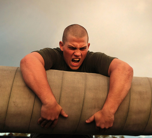 Muscular strength training - Soldier struggling with log