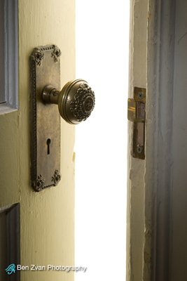 Crime Safety Tips - A door left lightly open with light shining through