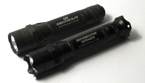 Two black Surefire tactical flashlights